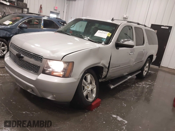 2011 Chevrolet Suburban LTZ with VIN 1GNSKKE31BR143238, listed as a IAAI auction lot 41621927 with 224,313 mi miles and . Bid and sale history available at DreamBid. Image 2.