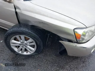 2006 Toyota Highlander z VIN JTEDW21AX60006508, wystawiony jako IAAI lot #41561183 z przebiegiem 171 196 mil mil oraz . Historia ofert i sprzedaży dostępna na DreamBid. Obrazek 6.
