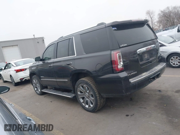 2015 GMC Yukon Denali with VIN 1GKS2CKJ2FR705806, listed as a IAAI auction lot 41568322 with 171,011 mi miles. Bid and sale history available at carsss.com. Image 14.