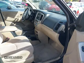 2004 Mazda Tribute LX with VIN 4F2CZ941X4KM29568, listed as a IAAI auction lot 41735353 with 285,989 mi miles and . Bid and sale history available at carsss.com. Image 5.