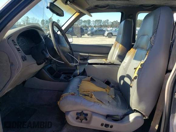 2000 Ford Explorer Sport with VIN 1FMYU60E4YUA35291, listed as a Copart auction lot 42510495 with 136,532 mi miles and Salvage title. Bid and sale history available at DreamBid. Image 7.