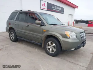 2007 Honda Pilot EX-L with VIN 2HKYF18767H538207, listed as a IAAI auction lot 41747624 with 214,026 mi miles. Bid and sale history available at carsss.com. Image 1.