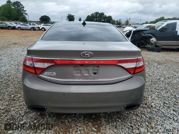 2013 Hyundai Azera z VIN KMHFH4JG4DA262993, wystawiony jako Copart lot #58497925 z przebiegiem 151 568 mil mil oraz Szkoda całkowita • Salvage title. Historia ofert i sprzedaży dostępna na DreamBid. Obrazek 6.