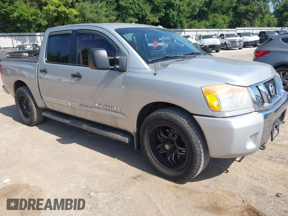 2012 Nissan Titan SV with VIN 1N6BA0ED8CN320723, listed as a IAAI auction lot 42642482 with 214,941 mi miles and . Bid and sale history available at DreamBid. Image 1.