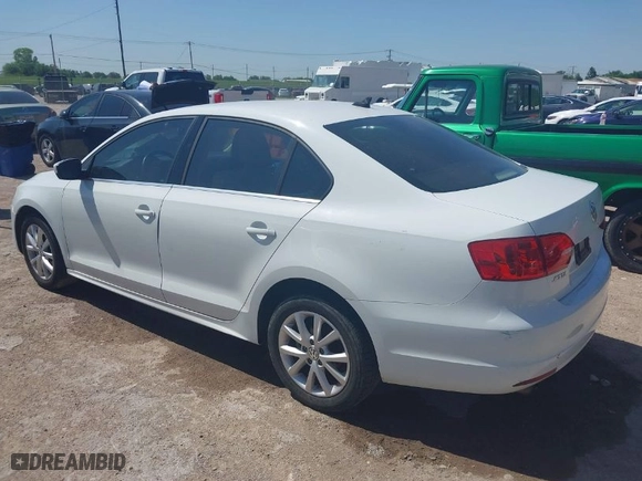 2014 Volkswagen Jetta Sedan SE with VIN 3VWD07AJ2EM310654, listed as a IAAI auction lot 41997453 with 126,801 mi miles. Bid and sale history available at carsss.com. Image 3.