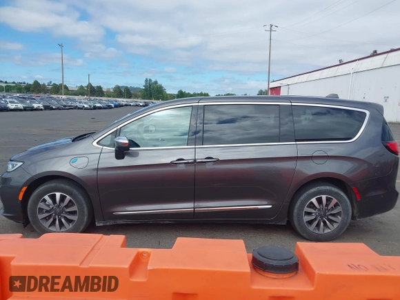 2022 Chrysler Pacifica Hybrid Limited with VIN 2C4RC1S72NR123083, listed as a IAAI auction lot 42623725 with 36,789 mi miles and . Bid and sale history available at DreamBid. Image 14.