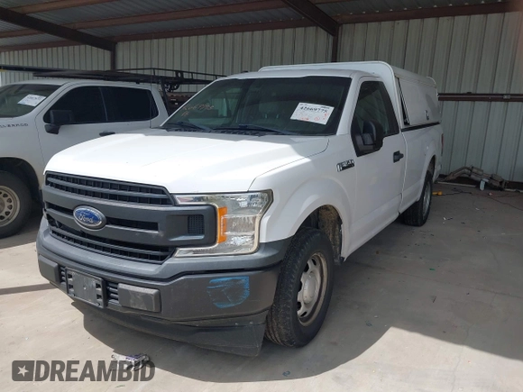 2018 Ford F-150 XL with VIN 1FTMF1CB1JKF83171, listed as a IAAI auction lot 42669775 with 128,140 mi miles and . Bid and sale history available at DreamBid. Image 2.
