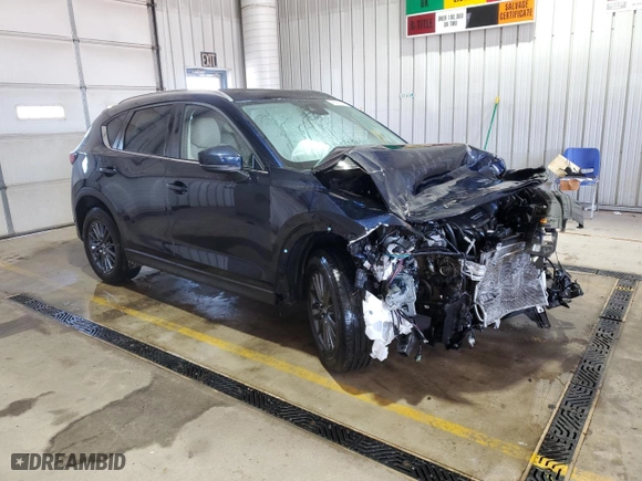 2019 Mazda CX-5 Touring with VIN JM3KFBCM1K0587787, listed as a Copart auction lot 49676975 with NaN miles and Salvage Title. Bid and sale history available at carsss.com. Image 4.