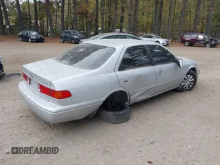 2000 Toyota Camry CE with VIN 4T1BG22K3YU715773, listed as a IAAI auction lot 40790259 with 202,717 mi miles and . Bid and sale history available at carsss.com. Image 4.