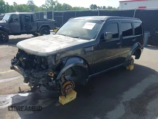 2011 Dodge Nitro Heat z VIN 1D4PT4GX1BW506231, wystawiony jako IAAI lot #42259663 z przebiegiem 179 355 mil mil oraz . Historia ofert i sprzedaży dostępna na DreamBid. Obrazek 2.