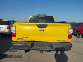 2016 Nissan Titan SL z VIN 1N6BA1F48GN500066, wystawiony jako IAAI lot #41857911 z przebiegiem 133 303 mil mil oraz . Historia ofert i sprzedaży dostępna na DreamBid. Obrazek 16.