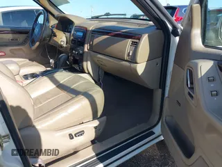 2001 Jeep Grand Cherokee Limited with VIN 1J4GW58S41C615418, listed as a IAAI auction lot 42141143 with 148,145 mi miles. Bid and sale history available at carsss.com. Image 5.