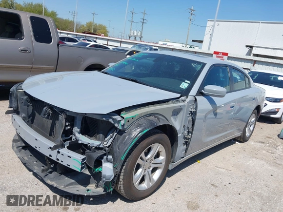 2022 Dodge Charger SXT with VIN 2C3CDXBG7NH204659, listed as a IAAI auction lot 41882695 with 49,773 mi miles and . Bid and sale history available at DreamBid. Image 2.