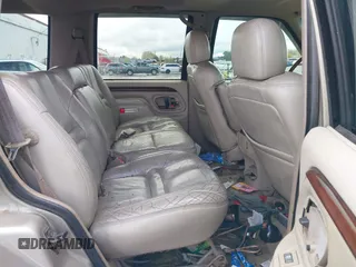 1999 Cadillac Escalade z VIN 1GYEK13R4XR410963, wystawiony jako IAAI lot #40599113 z przebiegiem 191 751 mil mil oraz . Historia ofert i sprzedaży dostępna na DreamBid. Obrazek 8.
