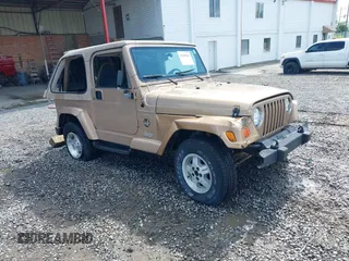 1999 Jeep Wrangler Sahara with VIN 1J4FY49S3XP407594, listed as a IAAI auction lot 42369363 with 253,780 mi miles and . Bid and sale history available at DreamBid. Image 1.