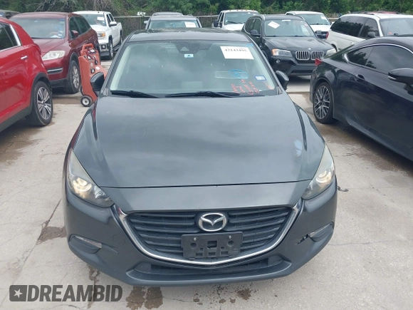 2017 Mazda 3 Touring with VIN 3MZBN1V74HM121397, listed as a IAAI auction lot 42143495 with 194,122 mi miles and . Bid and sale history available at DreamBid. Image 12.