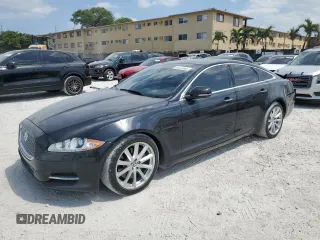 2012 Jaguar XJ with VIN SAJWA1CB5CLV27448, listed as a Copart auction lot 53373985 with 90,603 mi miles and Salvage Title. Bid and sale history available at DreamBid. Image 1.