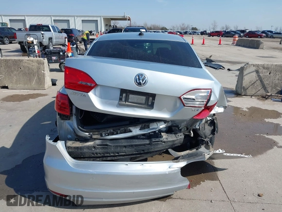 2014 Volkswagen Jetta TDI w/Premium with VIN 3VWLL7AJ6EM424935, listed as a IAAI auction lot 41533634 with 64,028 mi miles and . Bid and sale history available at DreamBid. Image 16.