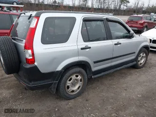 2006 Honda CR-V LX with VIN SHSRD68556U404171, listed as a IAAI auction lot 41927721 with 999,999 mi miles. Bid and sale history available at carsss.com. Image 4.