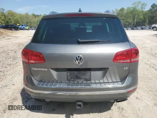 2016 Volkswagen Touareg Sport с VIN WVGEF9BP1GD012594, выставлен на аукционе Copart как лот 52438305 с пробегом 125 204 миль миль и Списание • Salvage title. История ставок и продаж доступна на DreamBid. Изображение 6.