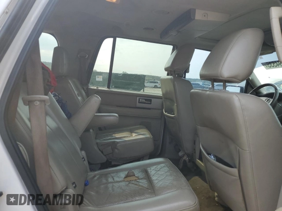 2010 Ford Expedition Limited z VIN 1FMJU1K55AEB52282, wystawiony jako Copart lot #57494535 z przebiegiem 211 434 mil mil oraz Szkoda całkowita • Salvage title. Historia ofert i sprzedaży dostępna na DreamBid. Obrazek 10.
