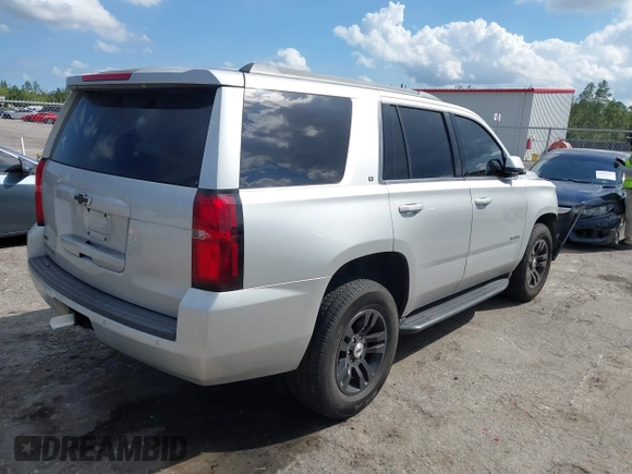 2018 Chevrolet Tahoe LT with VIN 1GNSCBKCXJR367852, listed as a IAAI auction lot 41549304 with 151,684 mi miles and . Bid and sale history available at DreamBid. Image 4.