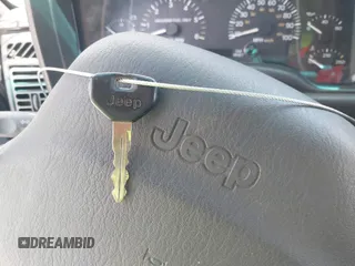 1999 Jeep Cherokee Sport with VIN 1J4FF68S0XL509171, listed as a IAAI auction lot 42402214 with Not provided miles and . Bid and sale history available at DreamBid. Image 11.