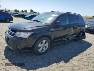 2012 Dodge Journey SXT with VIN 3C4PDCBG5CT333672, listed as a Copart auction lot 60373475 with 175,509 mi miles and Salvage title. Bid and sale history available at DreamBid. Image 1.