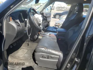 2019 Nissan Armada SL with VIN JN8AY2ND6K9090388, listed as a Copart auction lot 68142274 with 98,736 mi miles and Salvage Title. Bid and sale history available at carsss.com. Image 7.