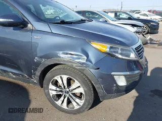 2012 Kia Sportage EX with VIN KNDPCCA22C7325011, listed as a IAAI auction lot 42046727 with 131,475 mi miles and . Bid and sale history available at DreamBid. Image 6.