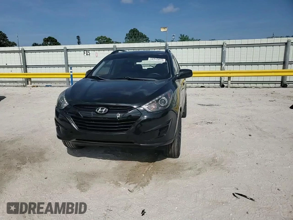 2010 Hyundai Tucson GLS with VIN KM8JU3AC2AU079129, listed as a Copart auction lot 54312875 with 116,659 mi miles and Salvage Title. Bid and sale history available at DreamBid. Image 14.
