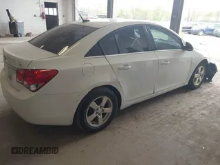 2014 Chevrolet Cruze 1LT with VIN 1G1PC5SB6E7115307, listed as a IAAI auction lot 42177022 with 120,535 mi miles and . Bid and sale history available at DreamBid. Image 4.