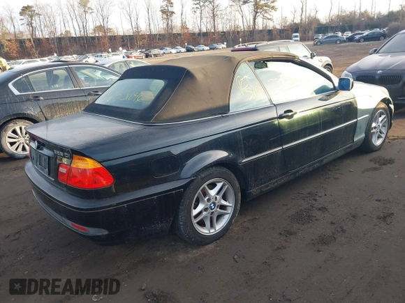 2004 BMW 3 Series 325Ci with VIN WBABW33474PG98269, listed as a IAAI auction lot 41457542 with 999,999 mi miles. Bid and sale history available at carsss.com. Image 4.