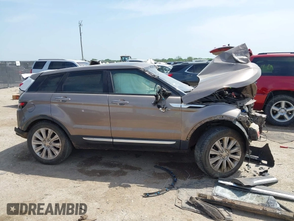 2015 Land Rover Range Rover Evoque Prestige with VIN SALVV2BG5FH001029, listed as a IAAI auction lot 42015106 with Not provided miles and . Bid and sale history available at DreamBid. Image 12.
