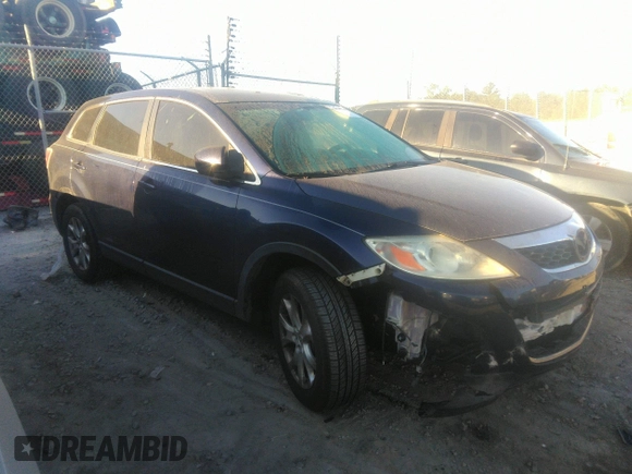 2011 Mazda CX-9 Touring with VIN JM3TB2CA7B0330879, listed as a IAAI auction lot 40628534 with 159,256 mi miles and . Bid and sale history available at DreamBid. Image 1.