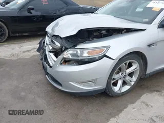 2012 Ford Taurus SHO z VIN 1FAHP2KT6CG142954, wystawiony jako IAAI lot #41526760 z przebiegiem 187 887 mil mil oraz . Historia ofert i sprzedaży dostępna na DreamBid. Obrazek 18.