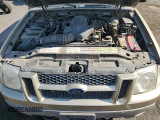 2001 Ford Explorer Sport z VIN 1FMYU70E71UA96419, wystawiony jako Copart lot #62736414 z przebiegiem 218 110 mil mil oraz Szkoda całkowita • Salvage title. Historia ofert i sprzedaży dostępna na DreamBid. Obrazek 11.