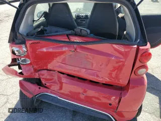 2014 Smart fortwo Pure z VIN WMEEJ3BA6EK745679, wystawiony jako Copart lot #56242784 z przebiegiem 86 991 mil mil oraz Szkoda całkowita • Salvage title. Historia ofert i sprzedaży dostępna na DreamBid. Obrazek 10.