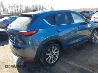 2020 Mazda CX-5 Grand Touring with VIN JM3KFBDM9L0756826, listed as a IAAI auction lot 41866290 with 145,567 mi miles. Bid and sale history available at carsss.com. Image 4.