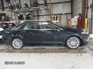 2016 Lincoln MKZ Hybrid with VIN 3LN6L2LU0GR608232, listed as a IAAI auction lot 41034486 with 99,637 mi miles and . Bid and sale history available at DreamBid. Image 12.
