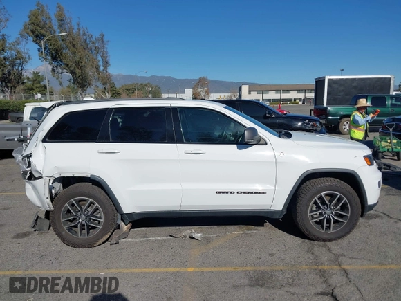 2017 Jeep Grand Cherokee Trailhawk with VIN 1C4RJFLGXHC959092, listed as a IAAI auction lot 41232281 with 108,659 mi miles and . Bid and sale history available at DreamBid. Image 13.