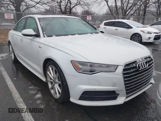 2018 Audi A6 Premium Plus z VIN WAUG3AFC6JN067023, wystawiony jako IAAI lot #41502341 z przebiegiem 132 440 mil mil oraz . Historia ofert i sprzedaży dostępna na DreamBid. Obrazek 1.