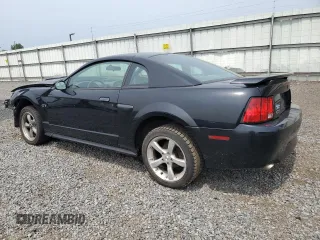 2002 Ford Mustang GT Deluxe with VIN 1FAFP42X62F236827, listed as a Copart auction lot 56749845 with 60,665 mi miles and Salvage title. Bid and sale history available at DreamBid. Image 2.