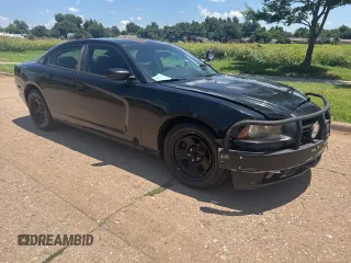 2012 Dodge Charger Police with VIN 2C3CDXAT9CH190436, listed as a Copart auction lot 64639655 with 106,638 mi miles and Clean title. Bid and sale history available at DreamBid. Image 1.
