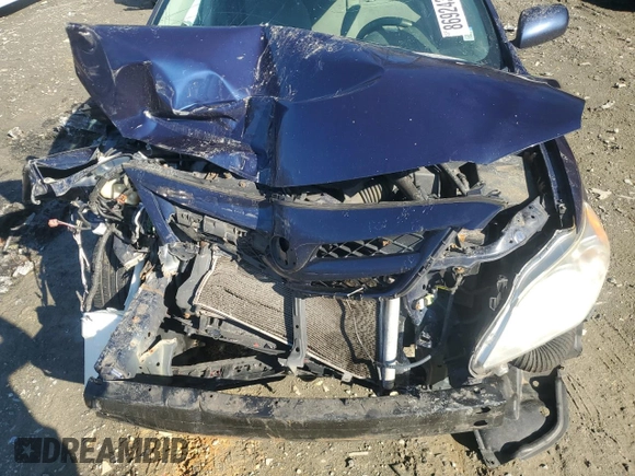 2012 Toyota Corolla L with VIN 2T1BU4EE4CC787585, listed as a Copart auction lot 86924334 with 0 mi miles and Salvage Title. Bid and sale history available at carsss.com. Image 12.