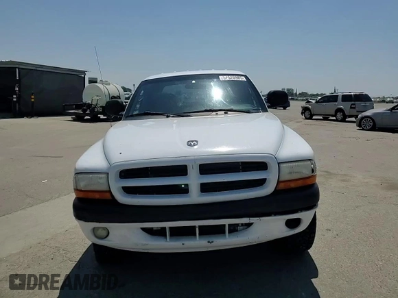 2000 Dodge Dakota Sport with VIN 1B7GG2AN8YS598547, listed as a Copart auction lot 54520985 with 244,605 mi miles and Salvage Title. Bid and sale history available at carsss.com. Image 13.