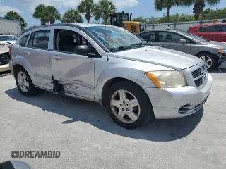 2009 Dodge Caliber SXT with VIN 1B3HB48A49D142621, listed as a Copart auction lot 55934095 with 158,885 mi miles and Non Repairable. Bid and sale history available at DreamBid. Image 4.
