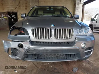 2012 BMW X5 35d with VIN 5UXZW0C59CL673416, listed as a IAAI auction lot 41910233 with 70,008 mi miles and . Bid and sale history available at DreamBid. Image 6.