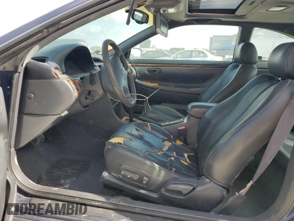 2000 Toyota Solara SE with VIN 2T1CF22P8YC357140, listed as a Copart auction lot 54100775 with 186,137 mi miles and Salvage Title. Bid and sale history available at DreamBid. Image 7.
