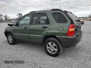 2005 Kia Sportage LX with VIN KNDJF723657074234, listed as a Copart auction lot 86792794 with 97,548 mi miles and Salvage Title. Bid and sale history available at carsss.com. Image 2.